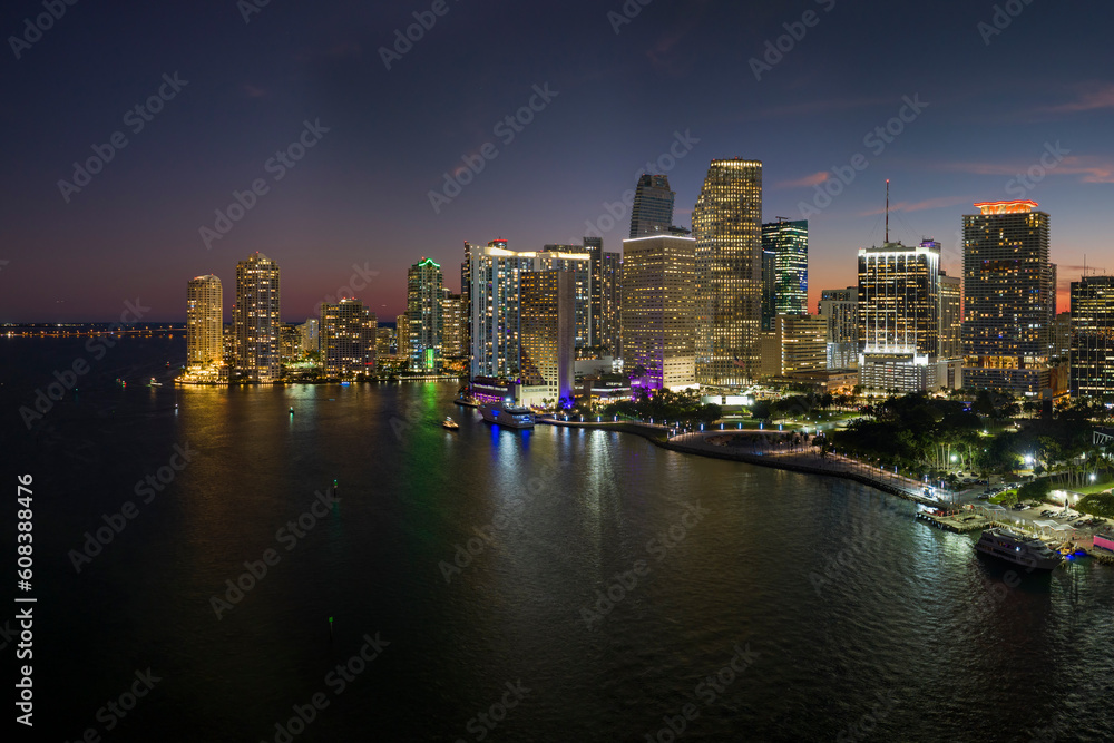 Night urban landscape of downtown district of Miami Brickell in Florida, USA. Skyline with illuminated high skyscraper buildings in modern american megapolis