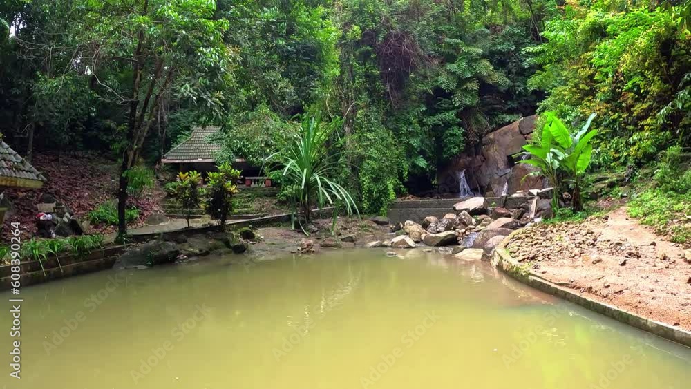 Kathu waterfall water gently flowing down the rocks Patong Phuket Thailand Asia Kathu waterfall water gently flowing down the rocks Patong Phuket Thailand Asia