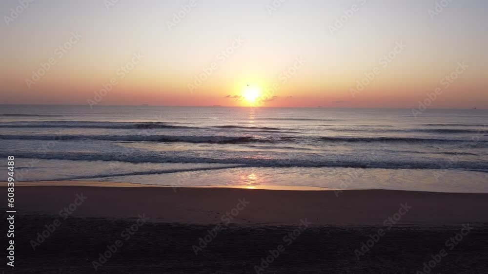 Beautiful view of the sea sunset with little birds flying Beautiful view of the sea sunset with little birds flying