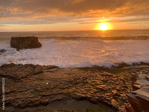 West coasting beach sunset with tide pools 
