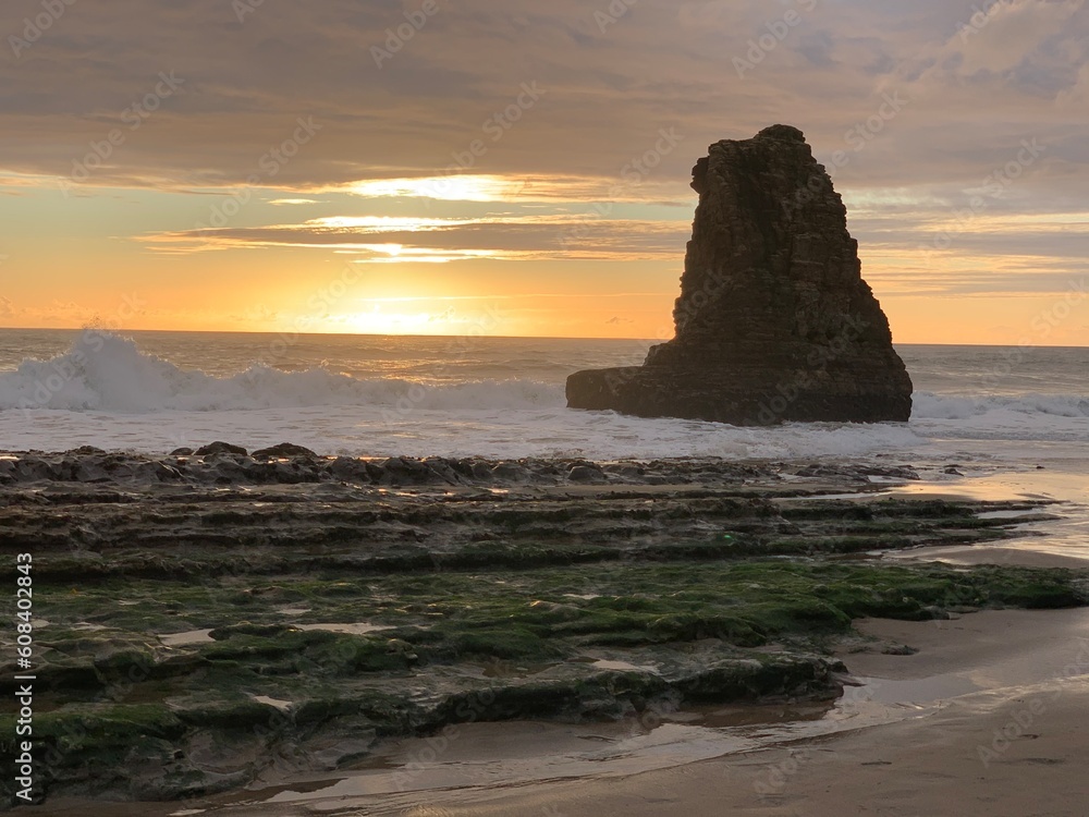 West Coast sunset with rock