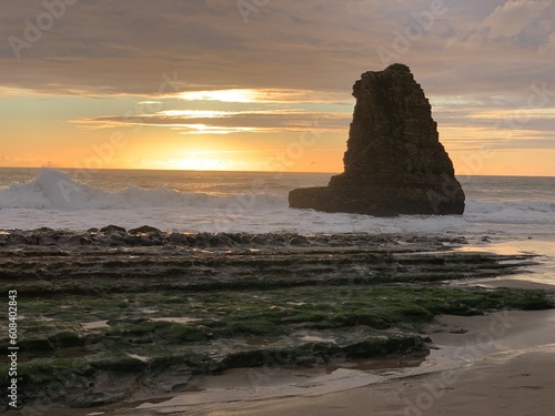 West Coast sunset with rock