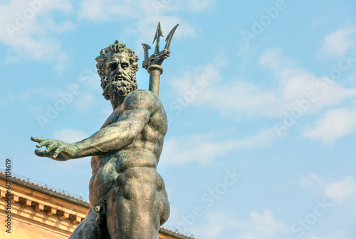 bologna historic center with fountain of neptune at christmas decorations in the streets