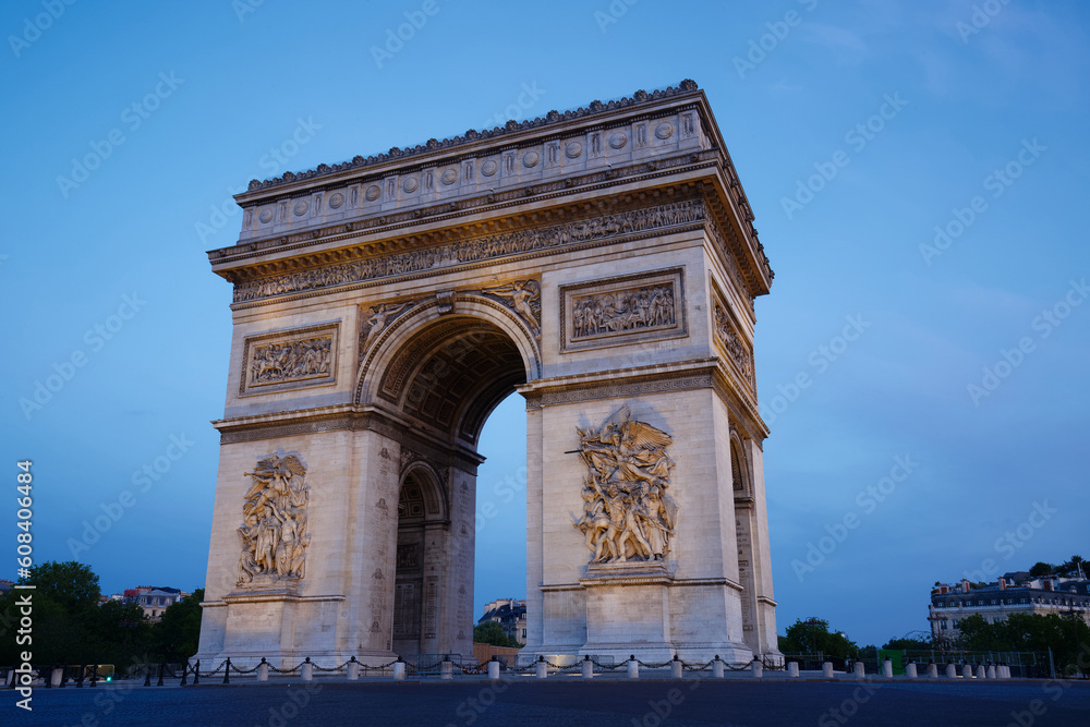 The famous Triumphal Arch in early morning , Paris, France.