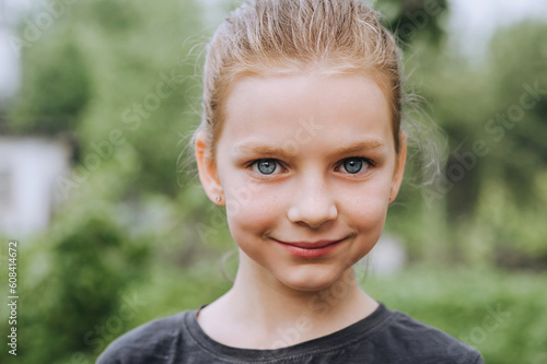 Cuadro en lienzo Photography, close-up face portrait of a red-haired girl, a child with freckles
