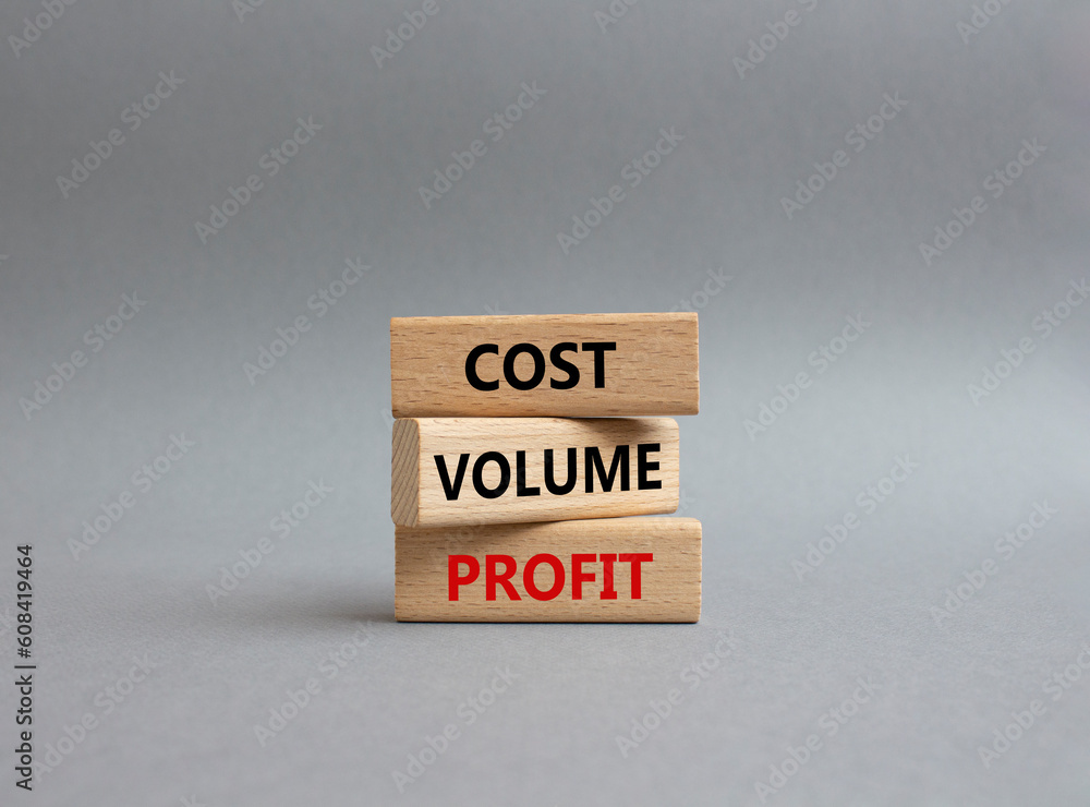Cost Volume Profit symbol. Concept word Cost Volume Profit on wooden blocks. Beautiful grey background. Business and Cost Volume Profit concept. Copy space Cost Volume Profit symbol. Concept word Cost Volume Profit on wooden blocks. Beautiful grey background. Business and Cost Volume Profit concept. Copy space