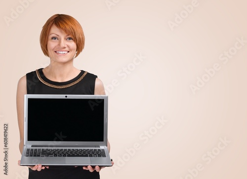 Young happy employee woman use laptop computer