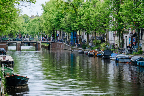 Photography Canal in Amsterdam with green trees