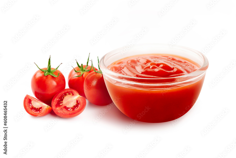Glass bowl of tomato sauce and tomatoes on white background. Glass bowl of tomato sauce and tomatoes on white background.