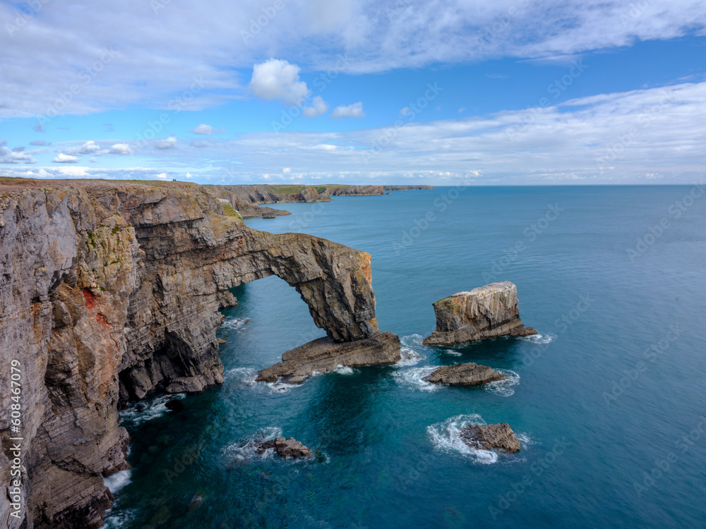 Pembroke, UK - September 24, 2022:  The Green Bridge of Wales natural sea arch at Manorbier