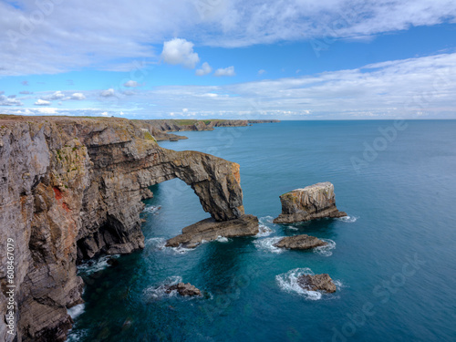 Pembroke, UK - September 24, 2022: The Green Bridge of Wales natural sea arch at Manorbier