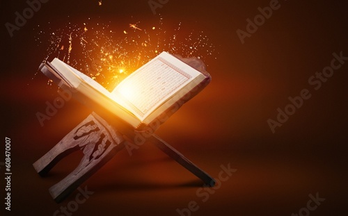 Holy Quran book on stand in dark background