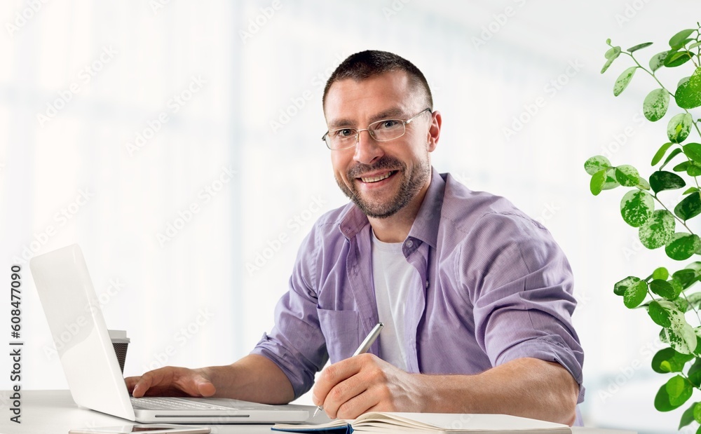 Creative young business man use laptop computer Creative young business man use laptop computer