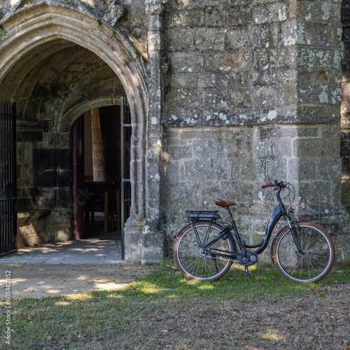 Retro bicycle by and old church © FrankBoston