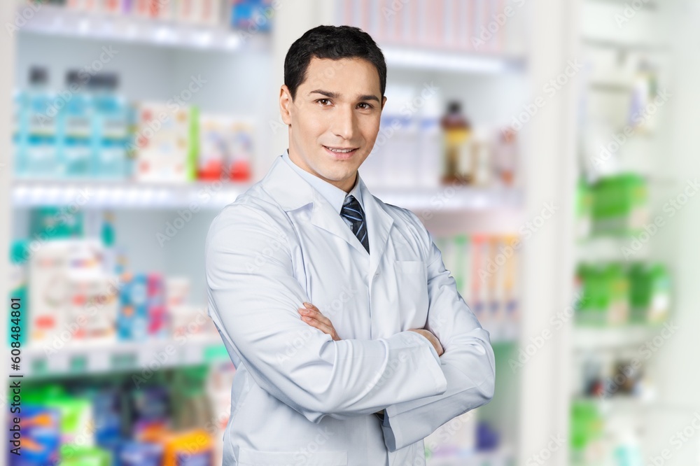 Happy confident young pharmacy worker posing