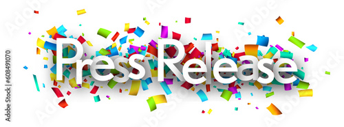 Press release sign with colorful cut out ribbon confetti.