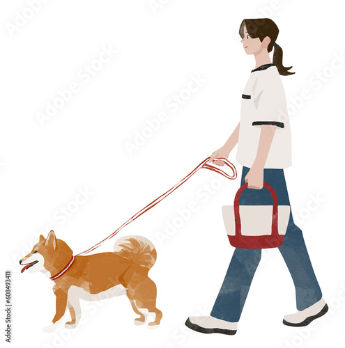 女性と散歩する柴犬、飼い主と愛犬