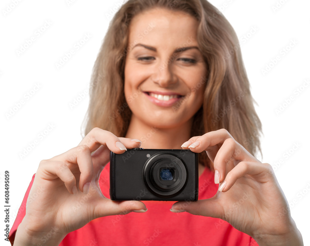 Pretty young woman holding camera isolated on white background Pretty young woman holding camera isolated on white background