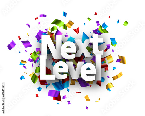Next level sign over cut out foil ribbon confetti background.