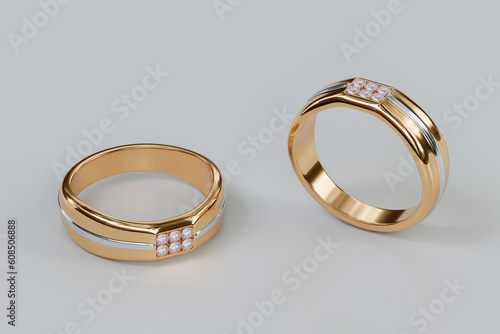 Two diamond gold ring on white background from design with 3d render.