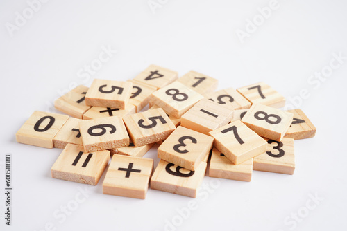 Number wood block cubes for learning Mathematic, education math concept.