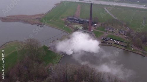 Cloudy morning at The Woudagemaal Lemmer under steam, panoramic drone shot 4k photo