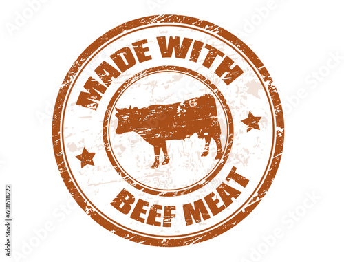 grunge office rubber stamp with the cow and the text made with beef meat written inside the stamp