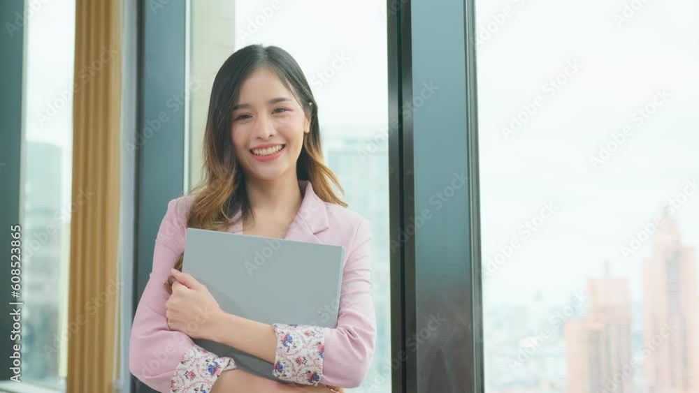 Portrait of Asian beautiful business woman smile while work in office. Portrait of Asian beautiful business woman smile while work in office.