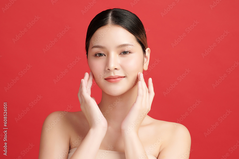 Beautiful young asian woman with clean fresh skin on red background, Face care, Facial treatment, Cosmetology, beauty and spa, Asian women portrait. Beautiful young asian woman with clean fresh skin on red background, Face care, Facial treatment, Cosmetology, beauty and spa, Asian women portrait.