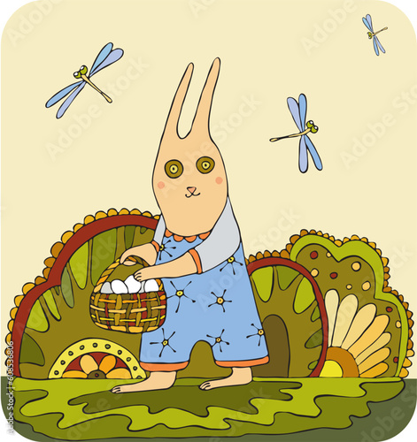 Easter rabbit with eggs in a basket
