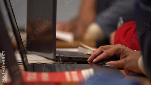 african american prisoner inmate in prison classroom on computer closer up hand 4k