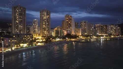 Wallpaper Mural Aerial view of Oahu city at night scene. Beautiful urban landscape of coastal bay city at dusk. City lights on Hawaii island 4K. Downtown Waikiki beach after sunset. Scenic Honolulu skyline panorama Torontodigital.ca