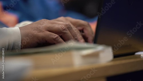 Wallpaper Mural close up african american reading book in prison black inmate in jail typing education 4k Torontodigital.ca