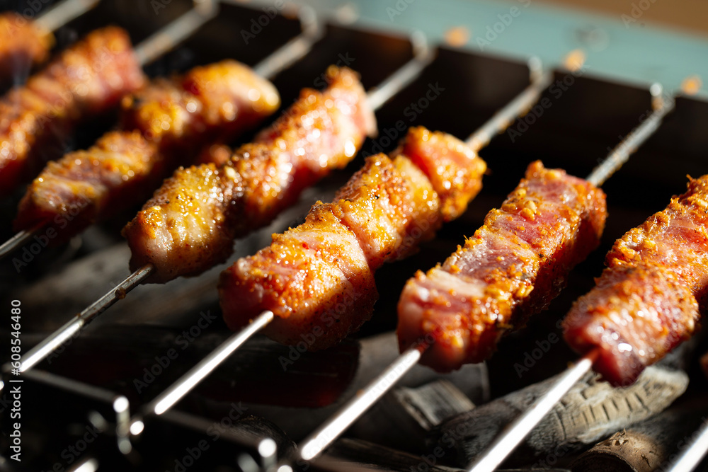 Grilled lamb skewers over charcoal Grilled lamb skewers over charcoal