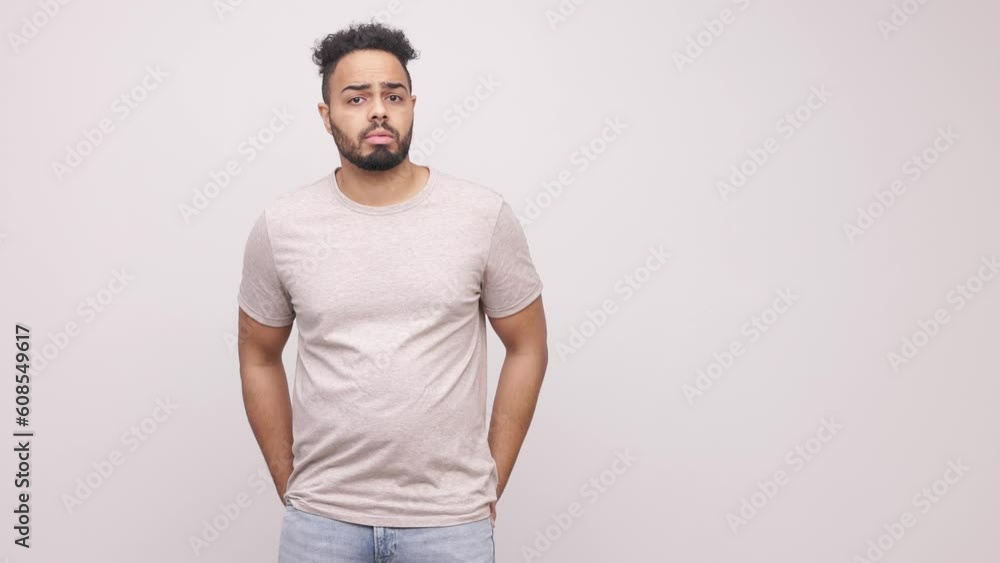 Confused man coming up with a good idea isolated on white background, Thoughtful pensive man with beard rubbing his chin contemplating, thinking over ideas for start up, pondering about work project. Confused man coming up with a good idea isolated on white background, Thoughtful pensive man with beard rubbing his chin contemplating, thinking over ideas for start up, pondering about work project.