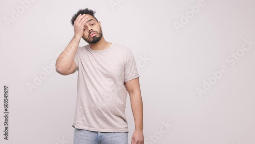 Young handsome african american man forgetting something, slapping forehead with palm and closing eyes. Concept: forgot something important