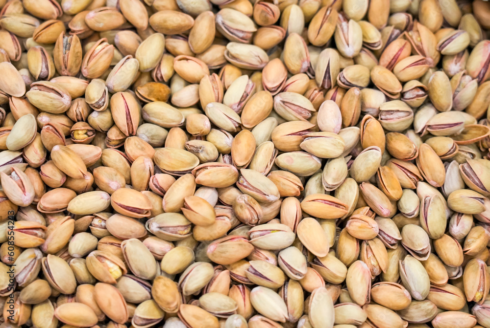 Pistachios at a market. Nuts with shell close-up.
Pistachios at a market. Nuts with shell close-up.