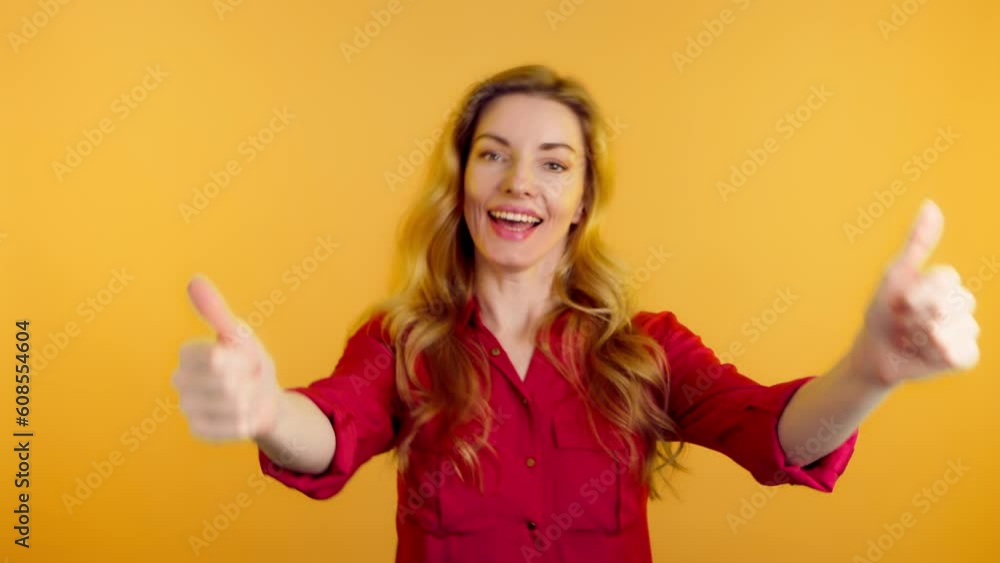 Yes gesture and winner woman smiling overjoyed nodding, say Yes. Positive optimistic happy young lady showing approving gesture, thumbs up, sincere emotions. Success lifestyle body language concept Yes gesture and winner woman smiling overjoyed nodding, say Yes. Positive optimistic happy young lady showing approving gesture, thumbs up, sincere emotions. Success lifestyle body language concept