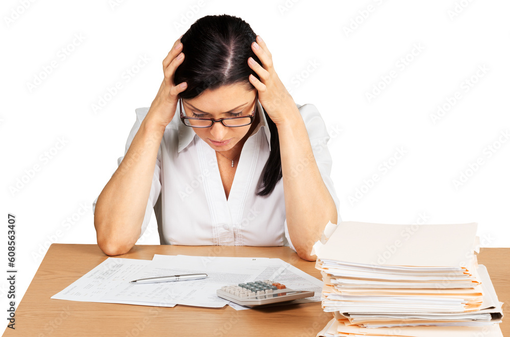 Businesswoman sitting at the table with many papers on background Businesswoman sitting at the table with many papers on background