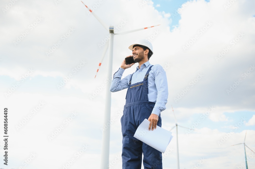 Worker inside sustainable energy industry - Engineer working at alternative renewable wind energy station