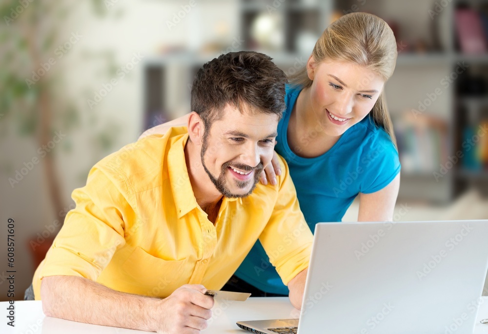 Business people looking something in laptop computer Business people looking something in laptop computer