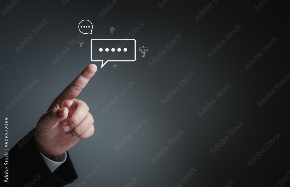 Businessman hand pointing at chat icon on digital web communication application and social network concept. social media application chat box Businessman hand pointing at chat icon on digital web communication application and social network concept. social media application chat box
