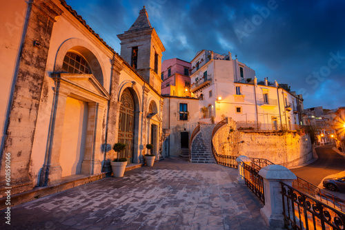 Ragusa, Sicily, Italy. Cityscape image of historical town Ragusa, Sicily with the St. Mary of the Stair church (Santa Maria delle Scale) at sunset. photo