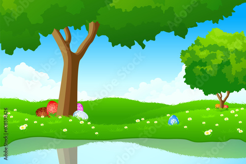 Green landscape with Easter eggs in the grass