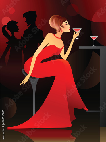 Young woman having cocktail at the bar