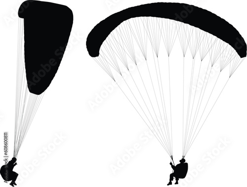 Silhouettes of flying paragliders. Vector