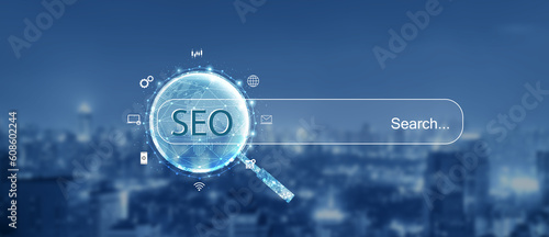 Wallpaper Mural Search engine optimization (SEO) concept on dark blue background. Internet technology for business companies. Large magnifying glass for monitoring and analyzing data. Torontodigital.ca