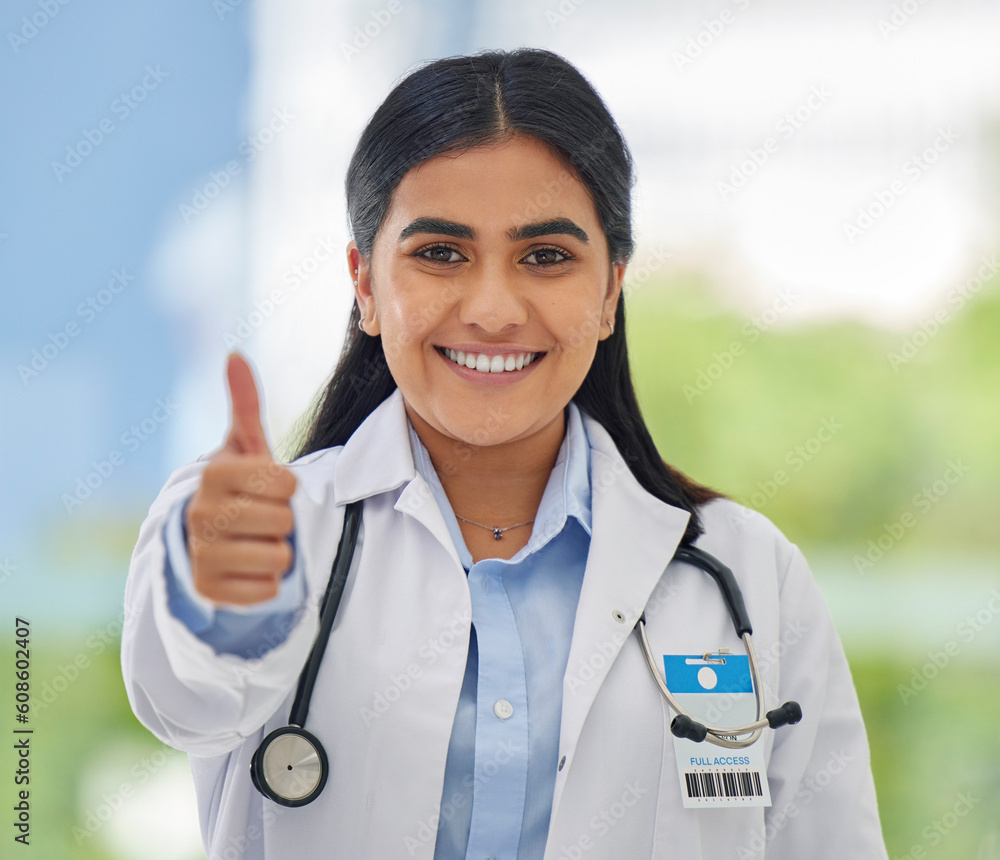 Woman, doctor portrait and thumbs up with hospital success, motivation and yes in clinic. Emoji, winner and like hand sign of a professional healthcare and wellness worker feeling happy from job Woman, doctor portrait and thumbs up with hospital success, motivation and yes in clinic. Emoji, winner and like hand sign of a professional healthcare and wellness worker feeling happy from job