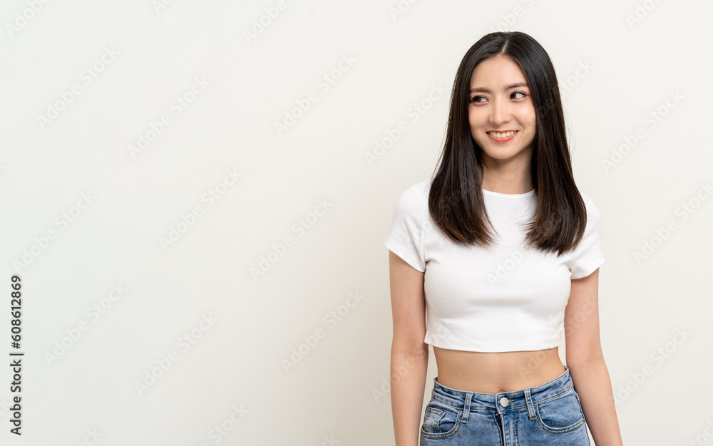 Beautiful young asian woman in white shirt. Charming female lady standing pose thinking on isolated white blank background. Asian cute people looking copy space for text advertise Beautiful young asian woman in white shirt. Charming female lady standing pose thinking on isolated white blank background. Asian cute people looking copy space for text advertise