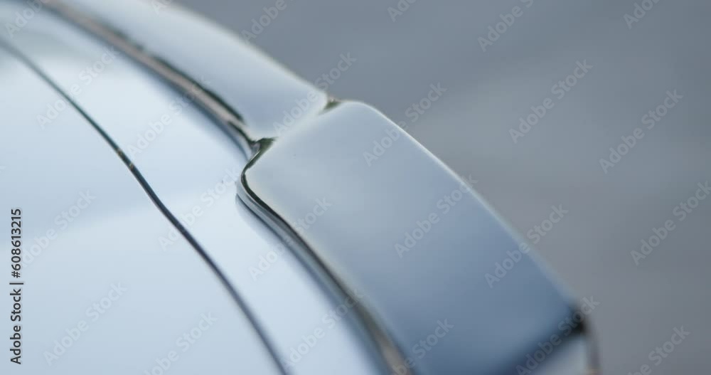 slow motion detail shot of car trimming in black slow motion detail shot of car trimming in black